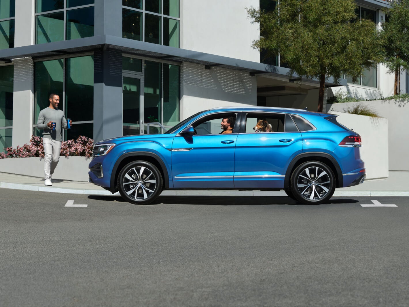 VW Atlas Cross Sport Driving in natural landscape