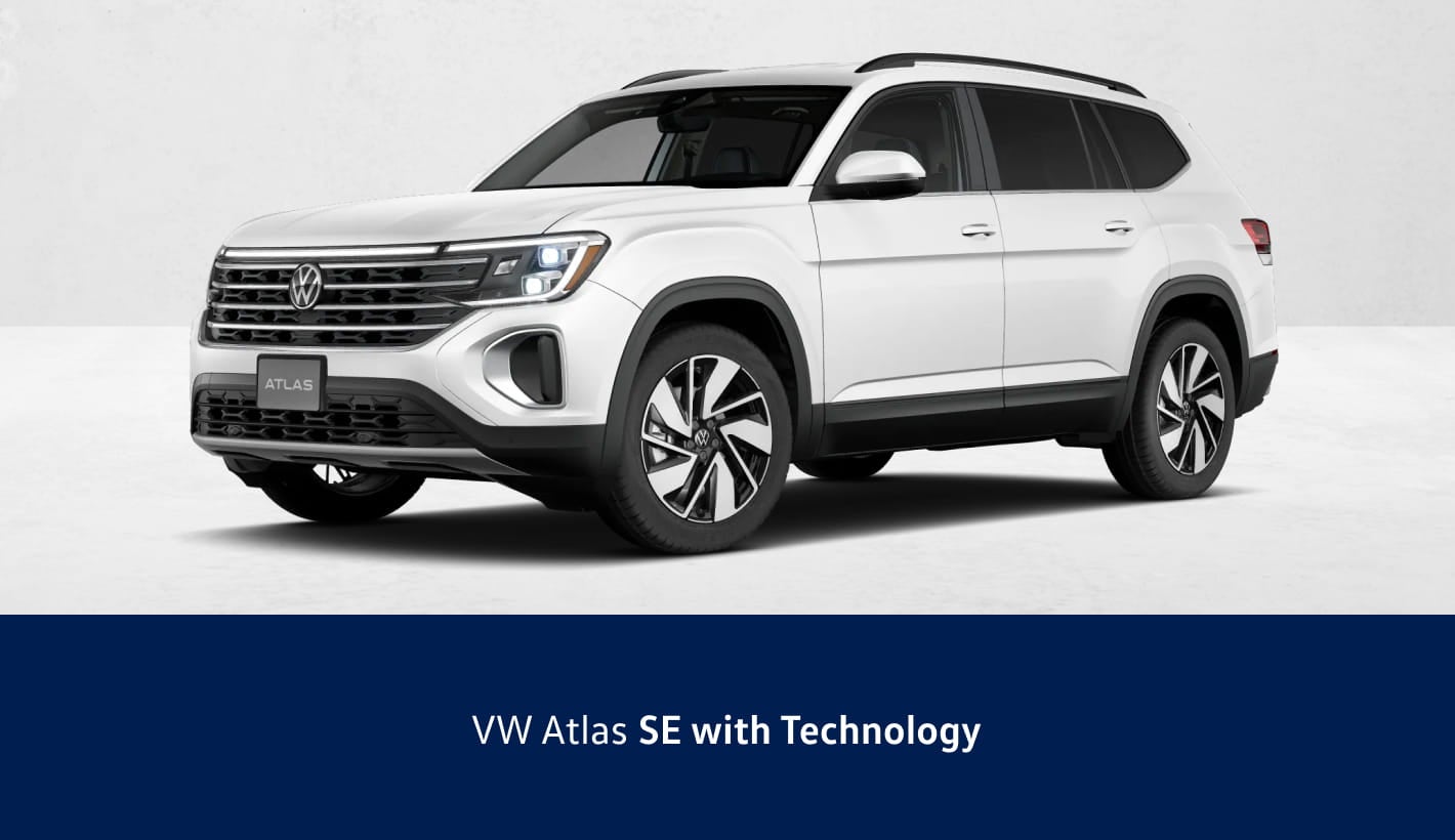 White Volkswagen Atlas SE with Tech shown in a front three-quarter view against a clean studio background.