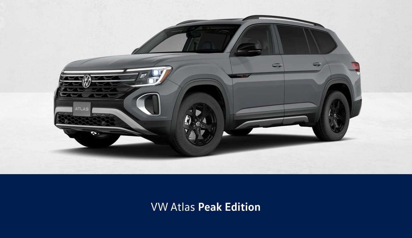 Gray Volkswagen Atlas Peak Edition shown in a front three-quarter view against a clean studio background.